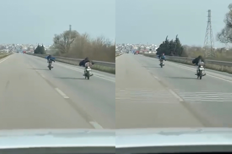 Bursa'da 115 km hızla motosiklet üzerinde uzanarak ilerlediler