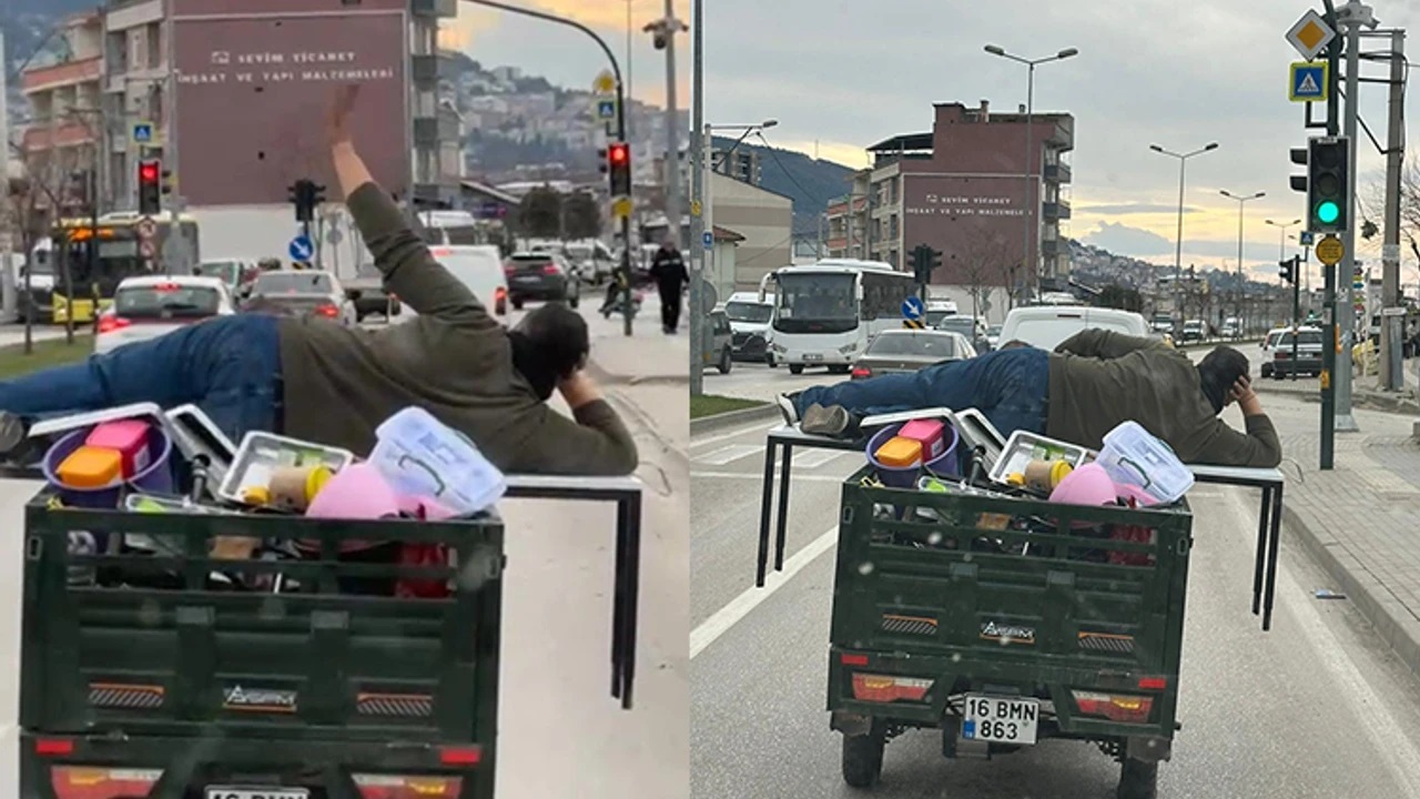 Motosikletin arkasında yatarak tehlikeli yolculuk