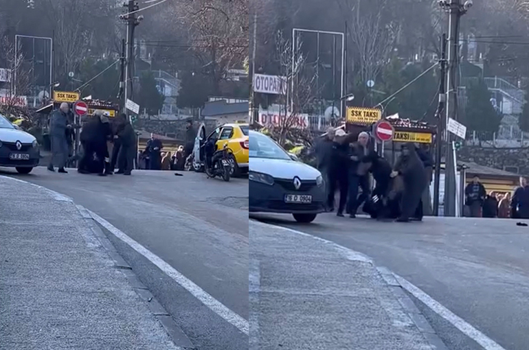 Taksici ile motosiklet sürücüsü tekme tokat kavga etti